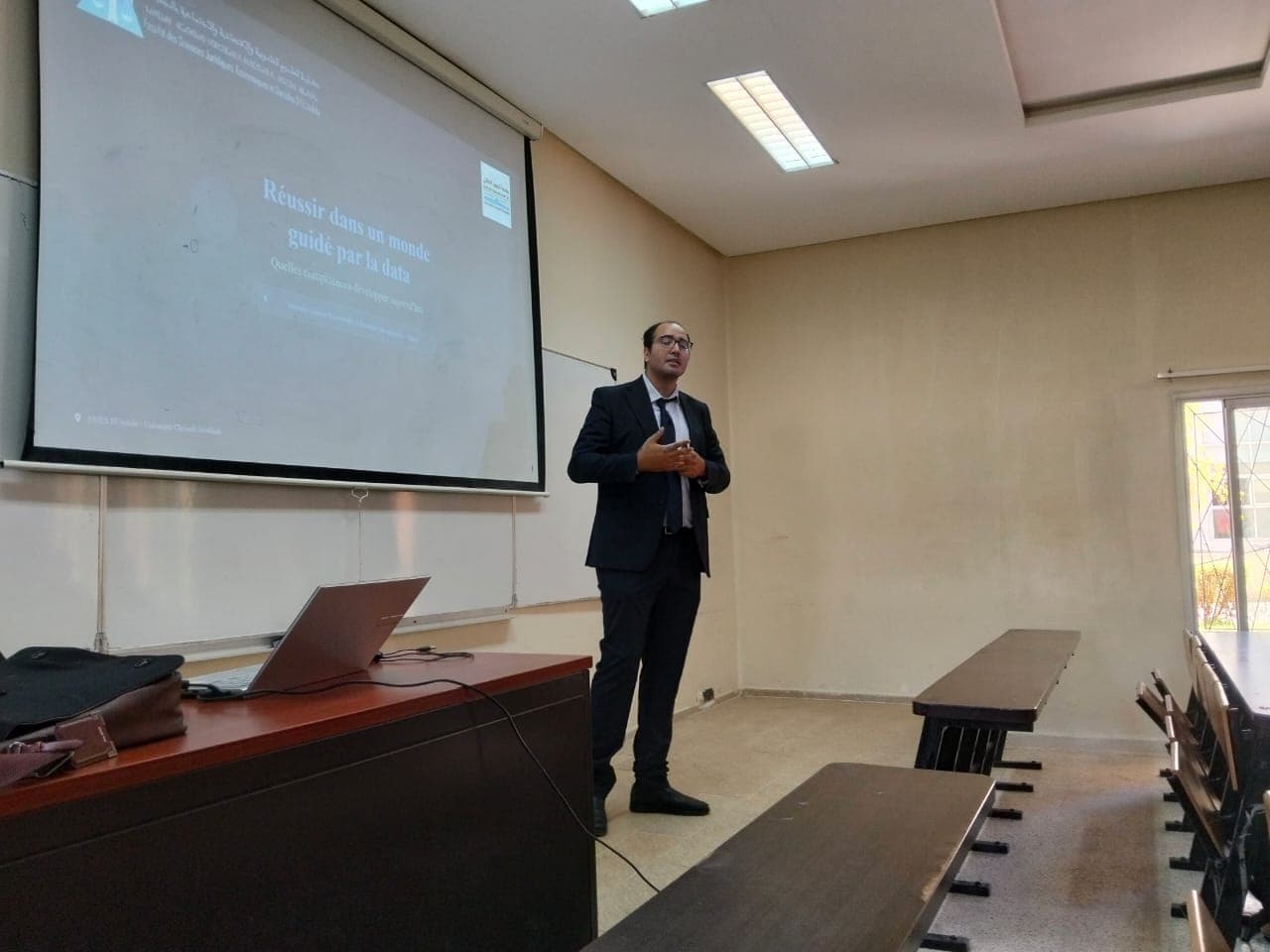 Professor Oussama Ritahi presenting in a university classroom